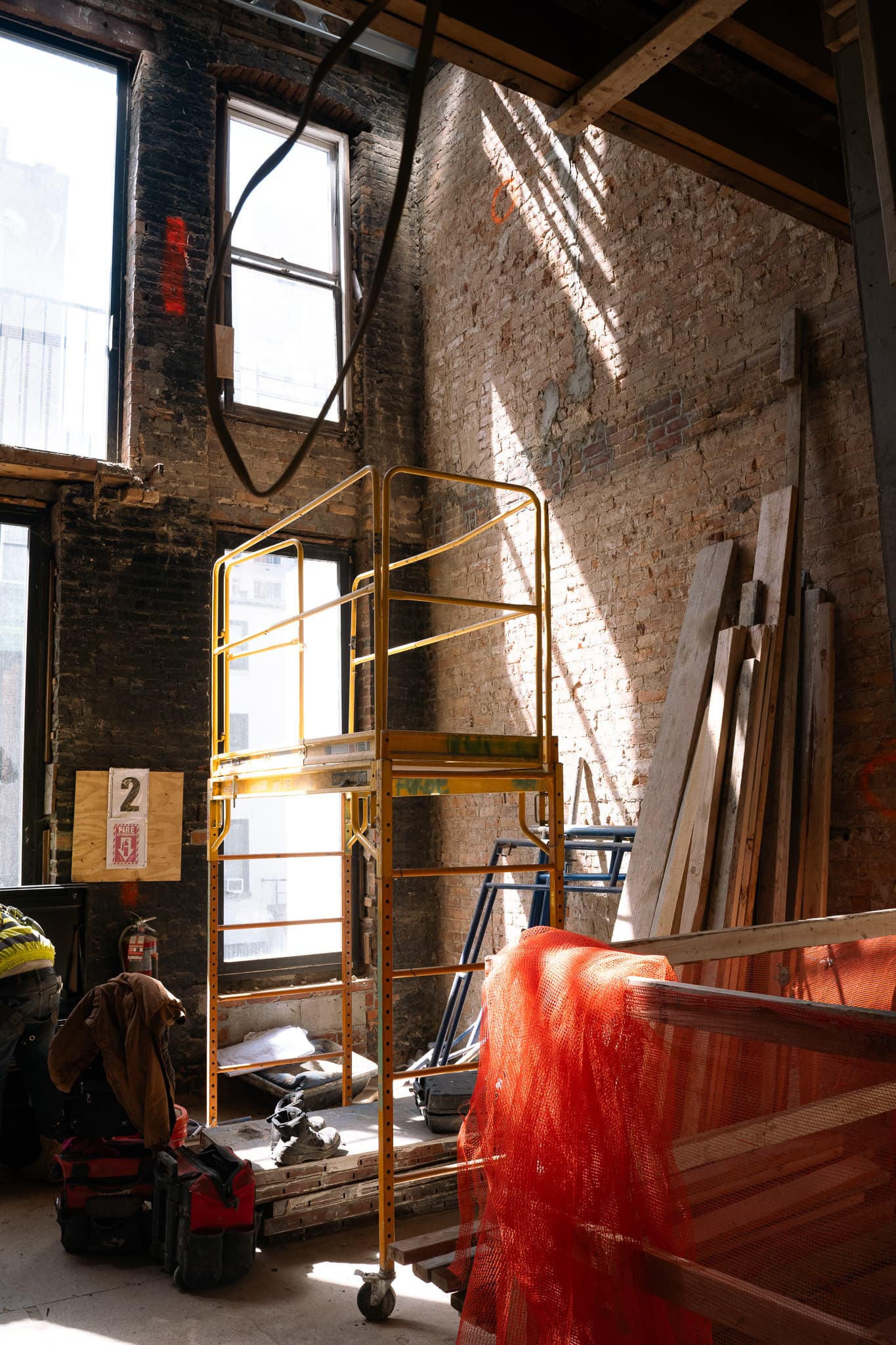 MJM Associates pre-construction — staged materials and finishes on site